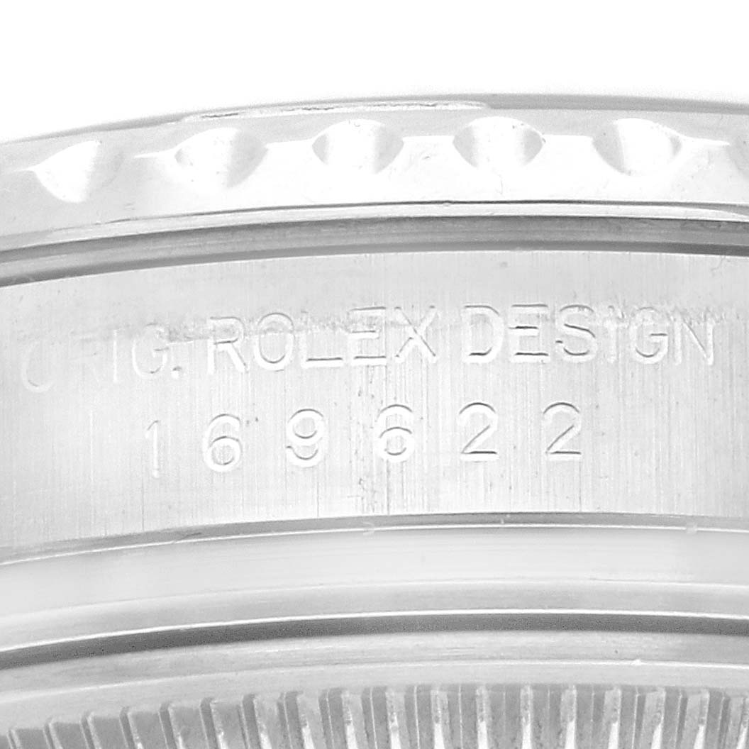 This close-up image shows the engraved case back of a Rolex Yacht-Master 169622 Women
s Stainless Steel Silver Dial 169622 Women
s Stainless Steel Silver Dial watch.