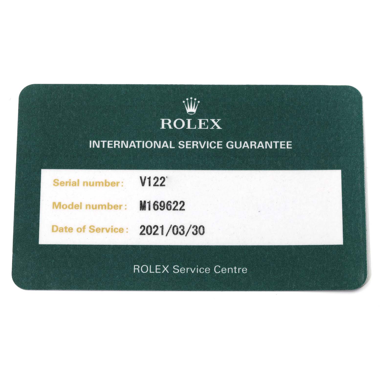 This image shows a Rolex service guarantee card for the Yacht-Master model viewable from the top.