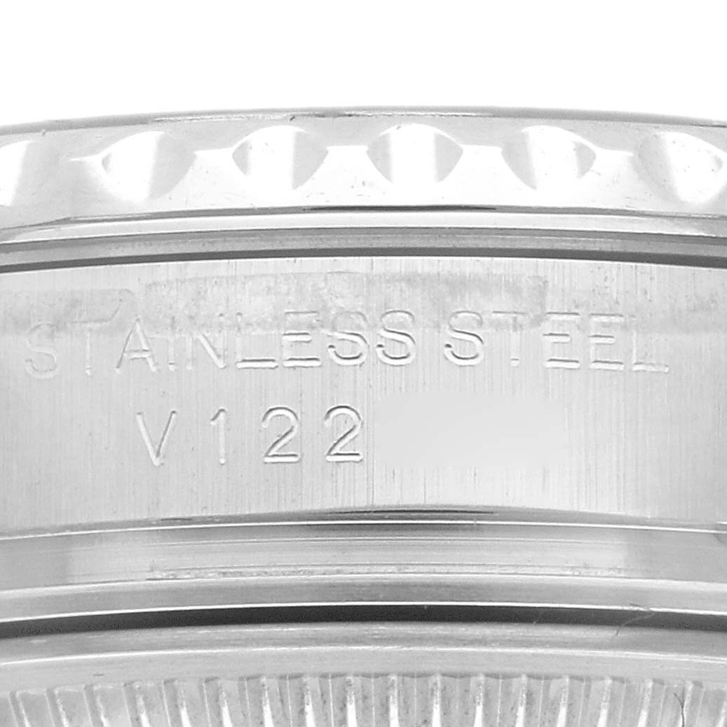 The image shows a close-up view of the case side of a Rolex Yacht-Master 169622 Women
s Stainless Steel Silver Dial 169622 Women
s Stainless Steel Silver Dial watch, highlighting its stainless steel material and engraving.