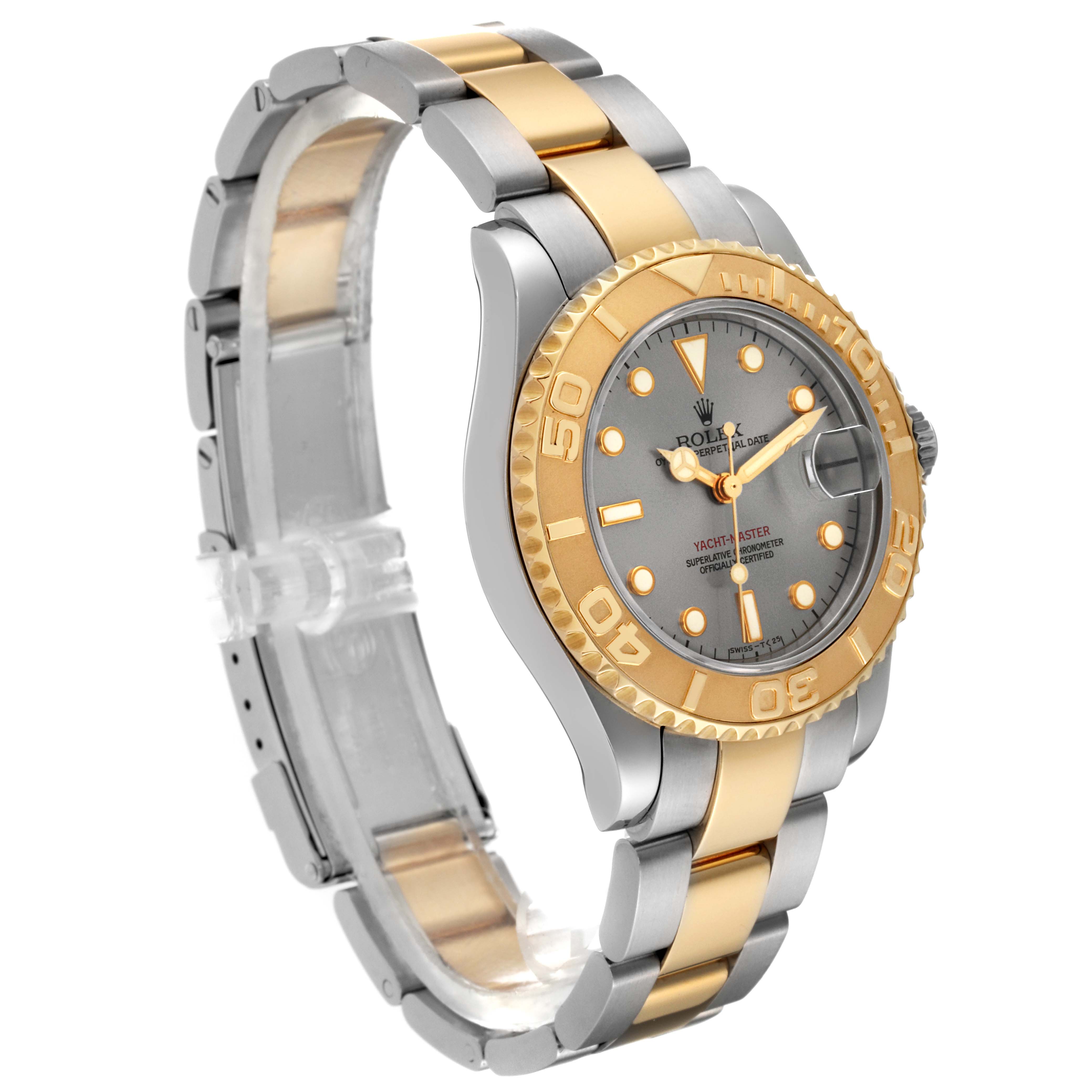 The image shows a side angle of the Rolex Yacht-Master 68623 Men's Steel and Gold (two tone) Grey Dial 68623 Men's Steel and Gold (two tone) Grey Dial watch, highlighting its gold bezel, dial, and two-tone bracelet.
