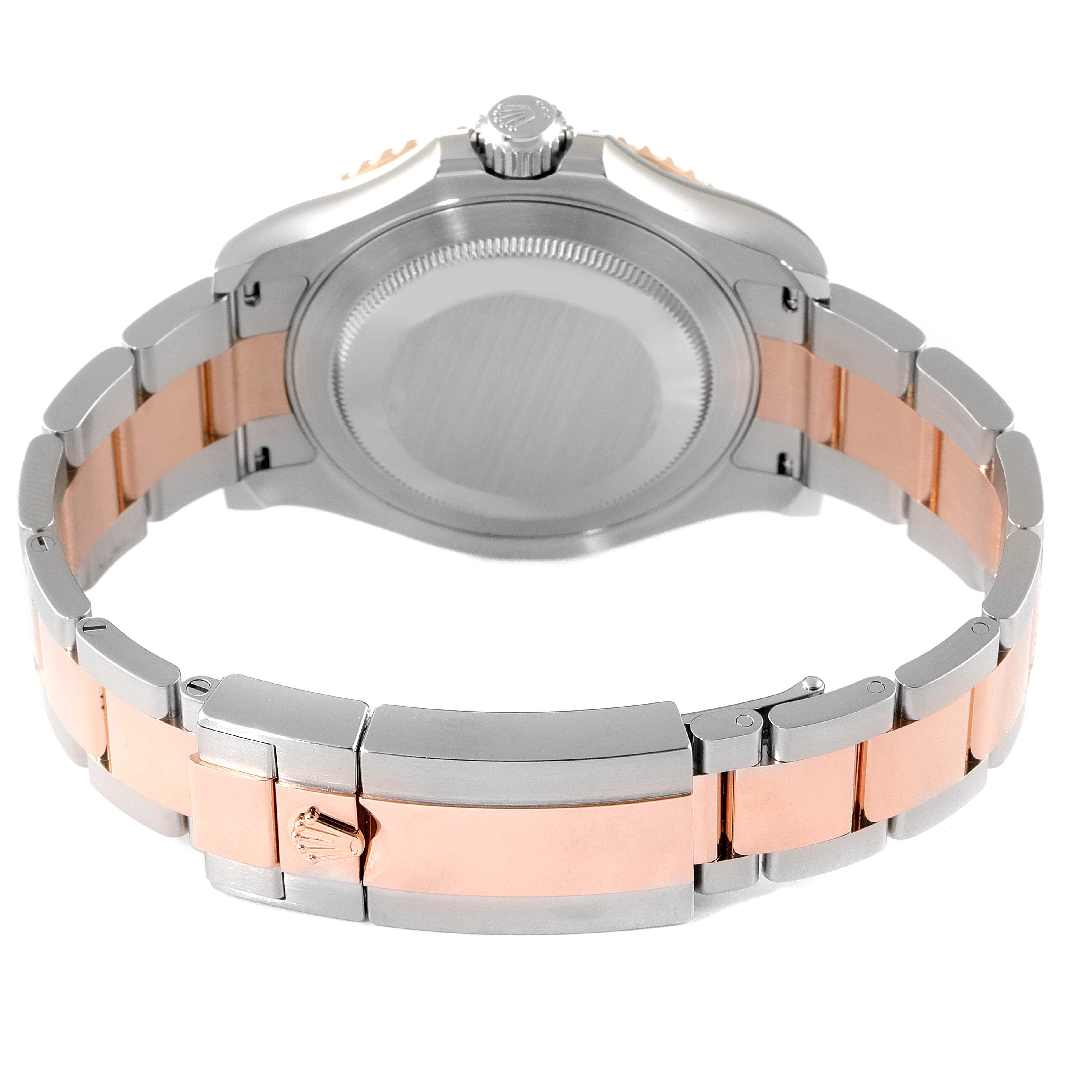 The image shows the back and bracelet of a Rolex Yacht-Master 116621 Men's Steel and Gold (two tone) Black Dial 116621 Men's Steel and Gold (two tone) Black Dial watch, focusing on the two-tone metal design and clasp.