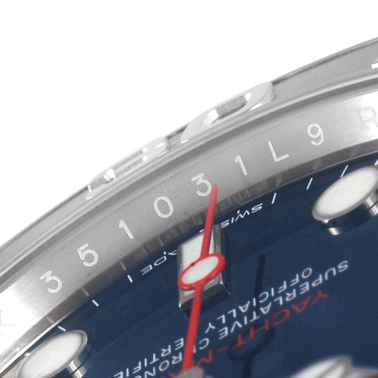 The image shows a close-up of the bezel and dial of a Rolex Yacht-Master 116622 Men
s Stainless Steel Blue Dial 116622 Men
s Stainless Steel Blue Dial watch, highlighting the numeral markers and second hand.