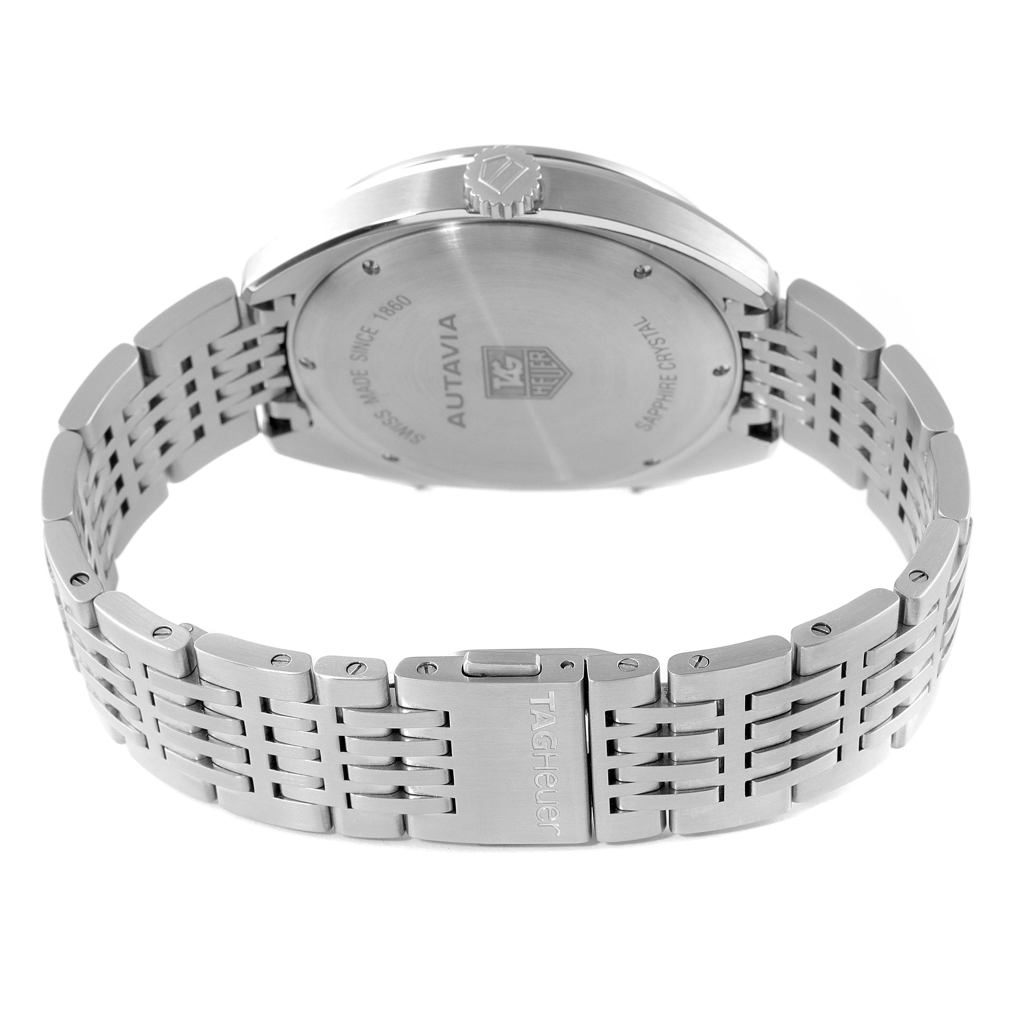 The image shows the back case and bracelet of the Tag Heuer Autavia CY2110 Men's Stainless Steel White Dial CY2110 Men's Stainless Steel White Dial watch laid flat, focusing on the brand engravings.