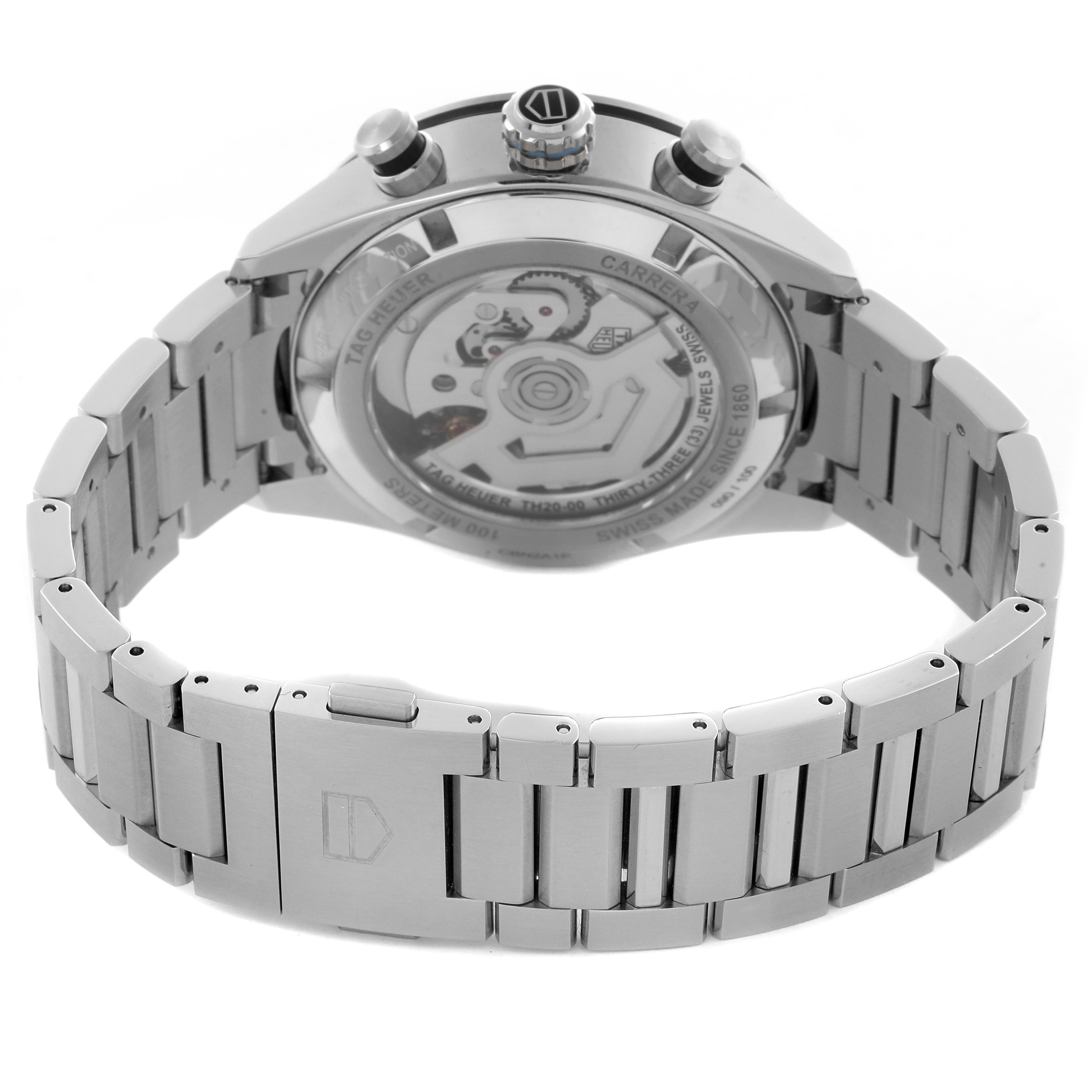 The image shows the back of a Tag Heuer Carrera CBN2A1P.BA0643 Men's Stainless Steel White Dial CBN2A1P.BA0643 Men's Stainless Steel White Dial watch, featuring the exhibition case back and stainless steel bracelet.