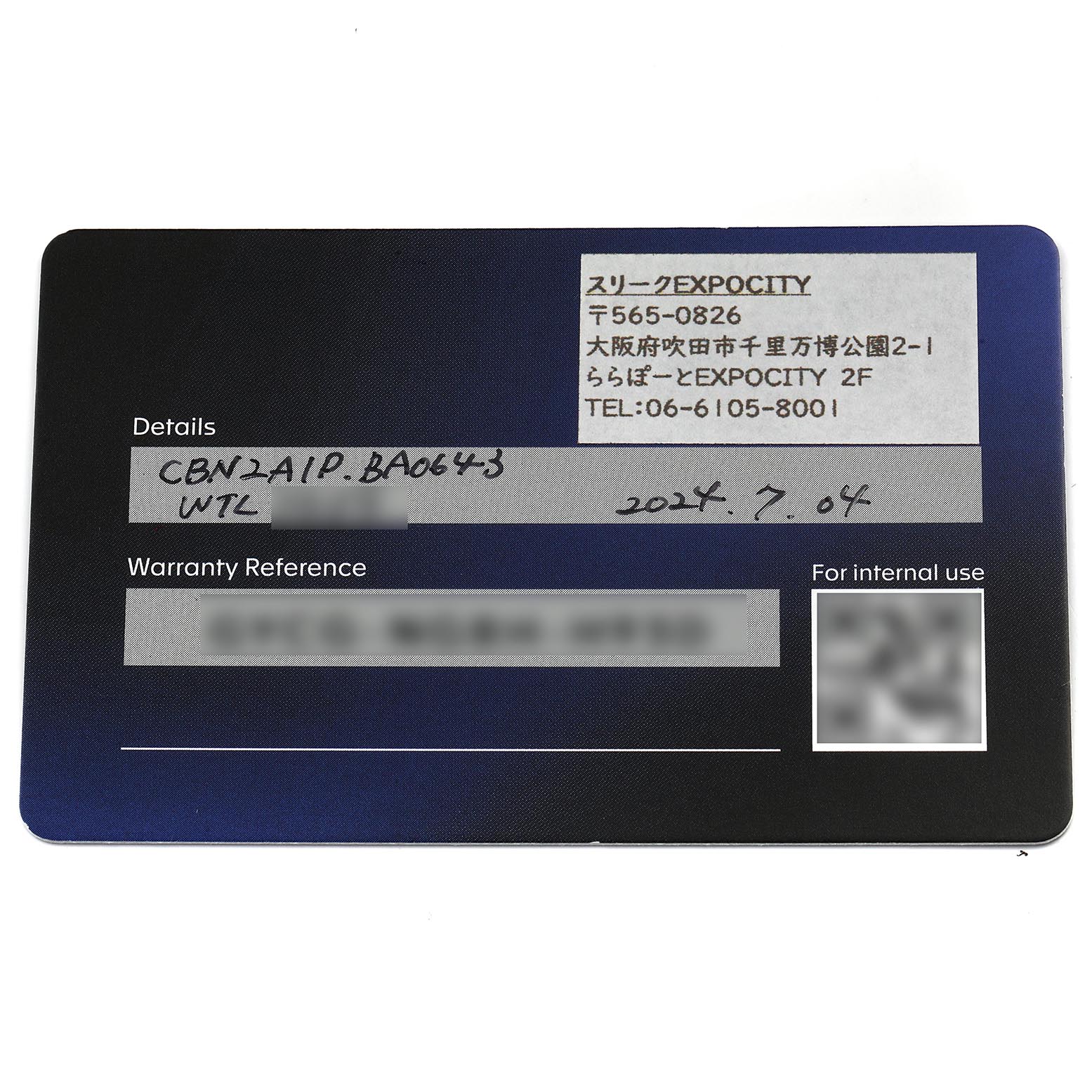 This image shows a warranty card for a Tag Heuer Carrera CBN2A1P.BA0643 Men's Stainless Steel White Dial CBN2A1P.BA0643 Men's Stainless Steel White Dial watch, viewed from a top-down angle.