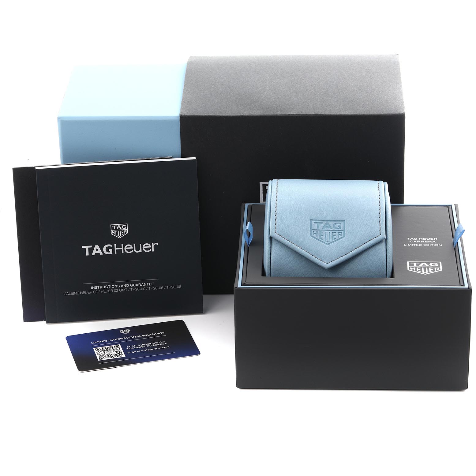 The image shows the packaging and accessories for a Tag Heuer Carrera CBN2A1P.BA0643 Men's Stainless Steel White Dial CBN2A1P.BA0643 Men's Stainless Steel White Dial watch, including a box, case, manual, and card.