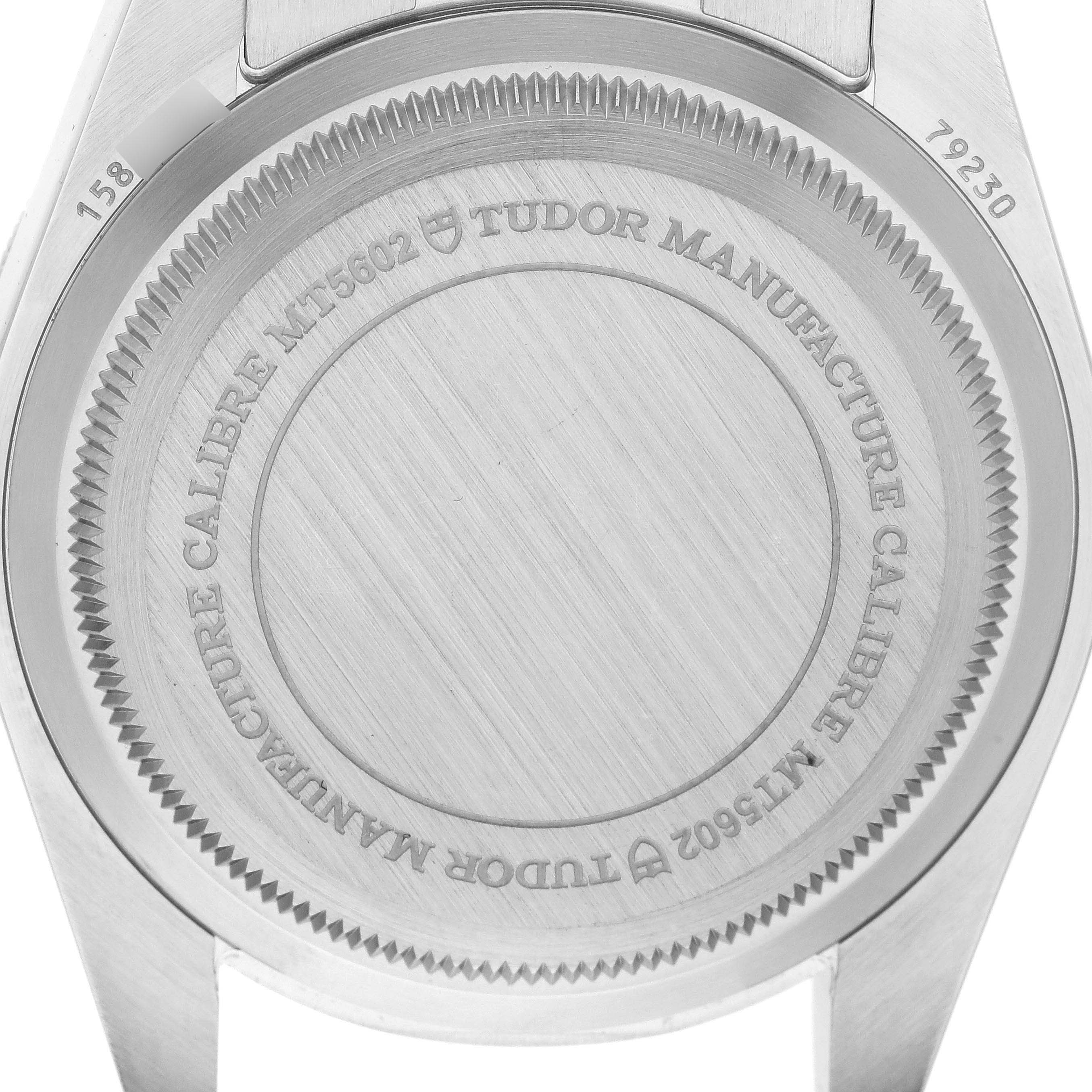 The image shows the back case of the Tudor Heritage Black Bay 79230B Men's Stainless Steel Black Dial 79230B Men's Stainless Steel Black Dial watch, displaying the model number and branding details.