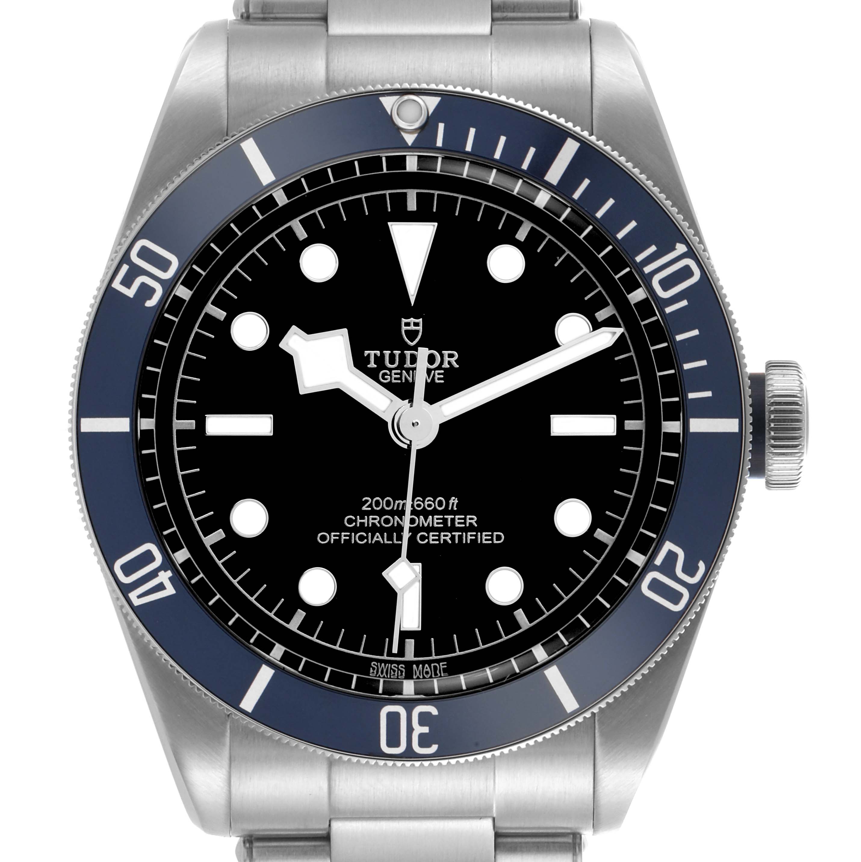 The Tudor Heritage Black Bay 79230B Men's Stainless Steel Black Dial 79230B Men's Stainless Steel Black Dial is shown from a front angle, displaying the dial, bezel, and crown.