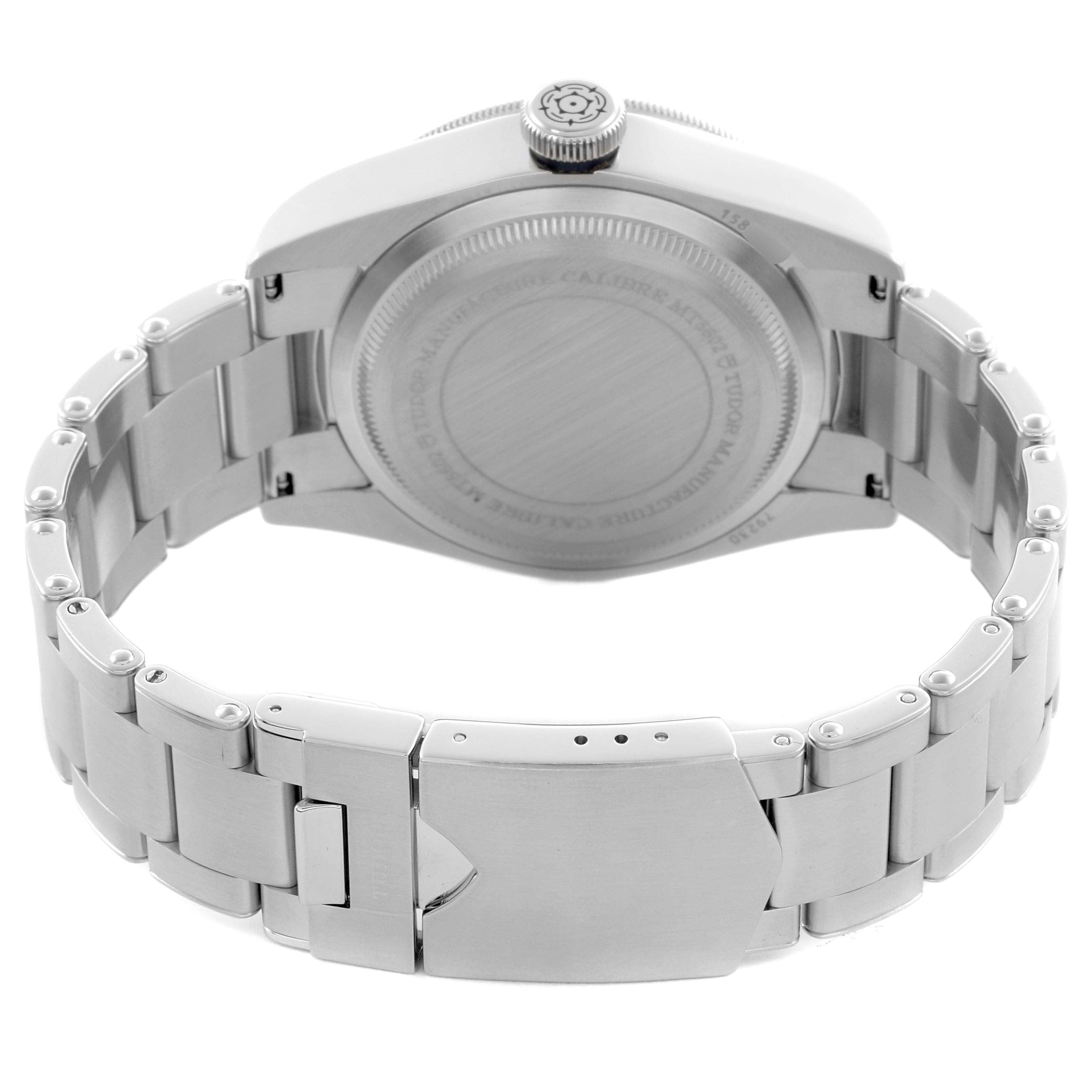 The image shows the rear view of the Tudor Heritage Black Bay 79230B Men's Stainless Steel Black Dial 79230B Men's Stainless Steel Black Dial watch, highlighting its case back and stainless steel bracelet.