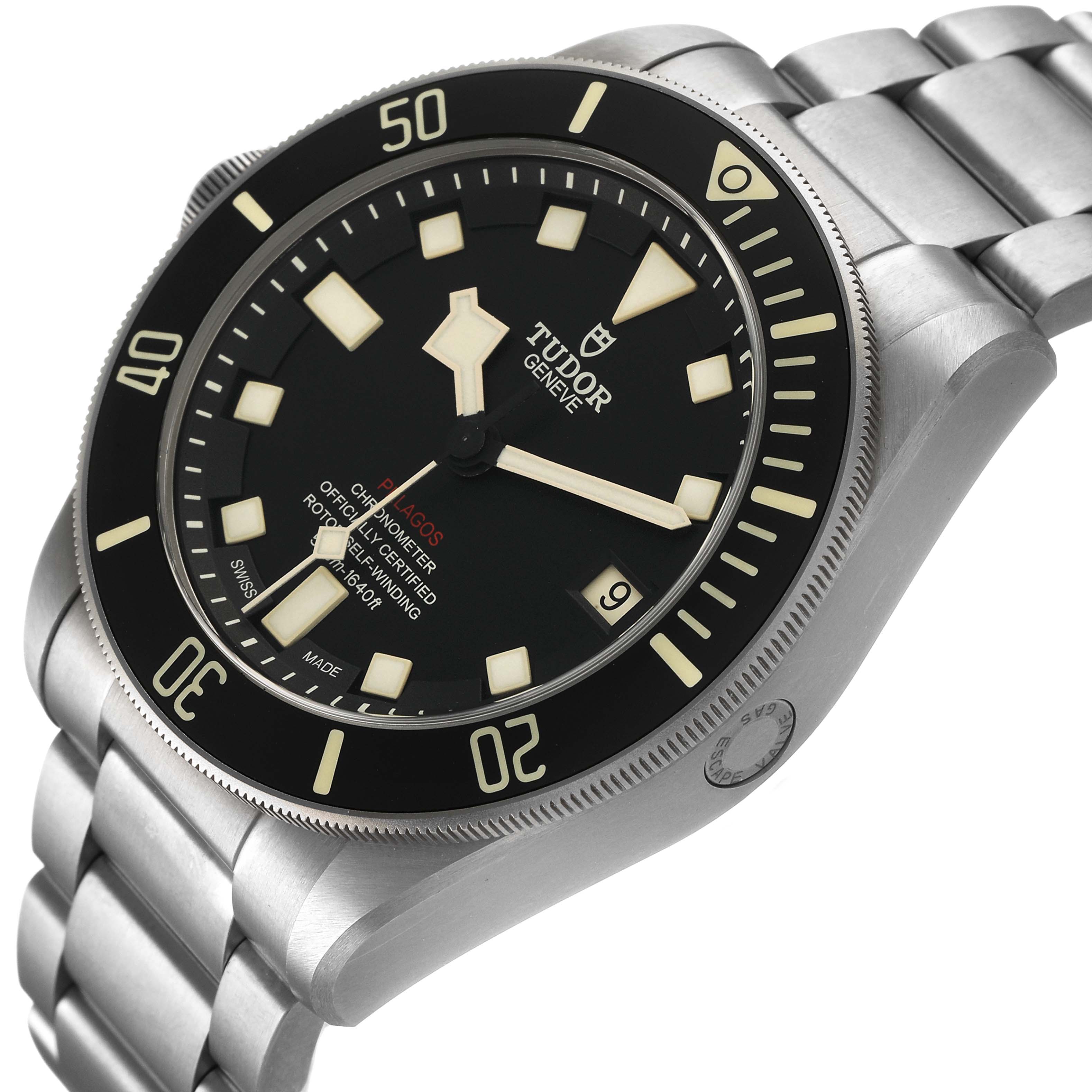 The Tudor Pelagos M25610TNL Men's Titanium Black Dial watch is shown at an angled view, highlighting the black dial, bezel, and part of the metal bracelet.