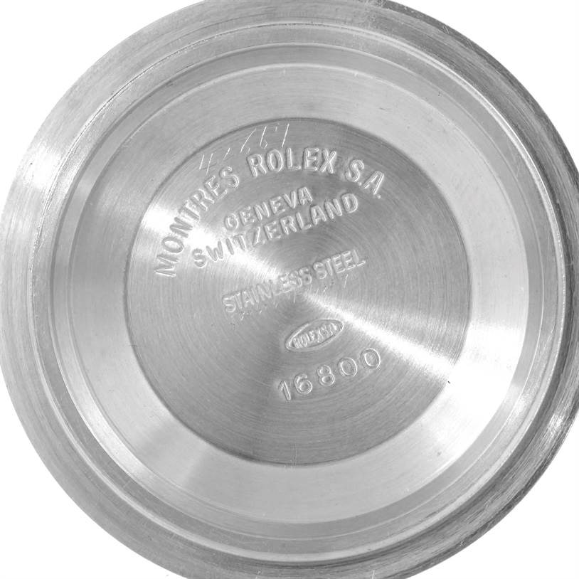 This image shows the stainless steel case back of a Rolex Submariner 168000 Men
s Stainless Steel Black Dial 168000 Men
s Stainless Steel Black Dial watch, model number 16800, viewed from the inside.