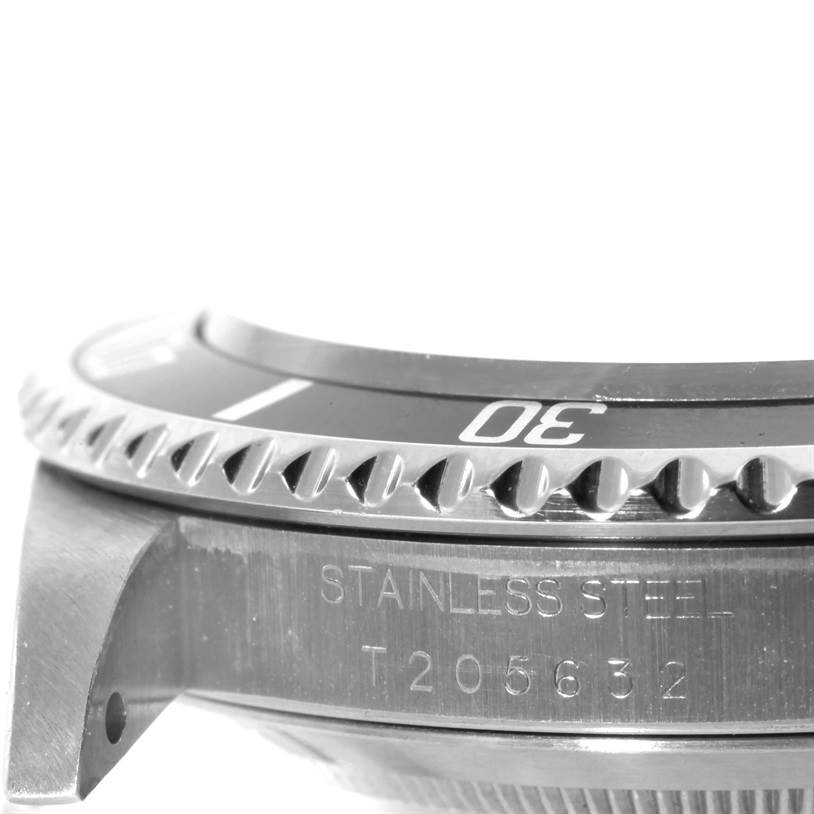 The image shows a close-up angle of the bezel and case side of a Rolex Submariner 14060 Men
s Stainless Steel Black Dial 14060 Men
s Stainless Steel Black Dial watch.