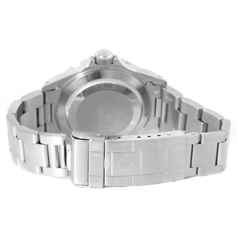 This image shows the back case, clasp, and bracelet of a Rolex Submariner 14060 Men
s Stainless Steel Black Dial 14060 Men
s Stainless Steel Black Dial watch from a rear angle.