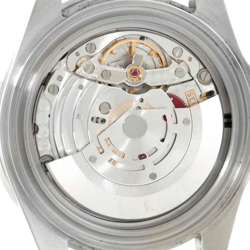 This image shows the movement of a Rolex Submariner 16610 Men
s Stainless Steel Black Dial 16610 Men
s Stainless Steel Black Dial, captured from the back with the case back removed.