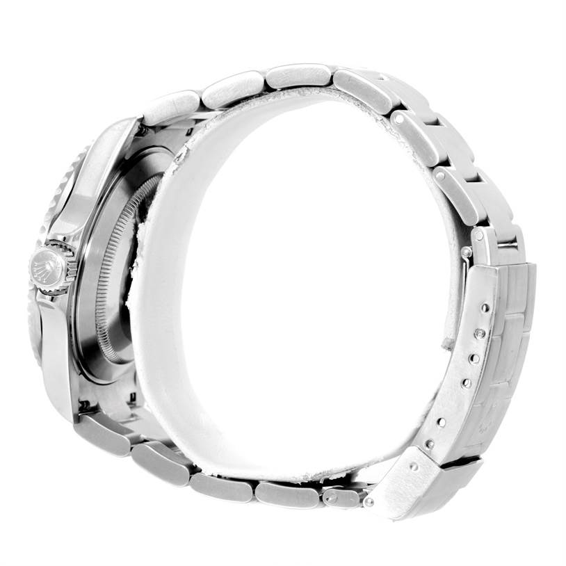 The image shows a side view of the Rolex Submariner 16610 Men
s Stainless Steel Black Dial 16610 Men
s Stainless Steel Black Dial watch, highlighting the bracelet and crown.