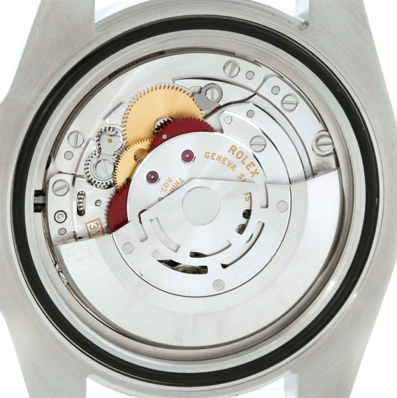 This is a rear view of the Rolex Submariner 116610LV Men's Stainless Steel Green Dial 116610LV Men's Stainless Steel Green Dial watch showing its internal mechanical movement.