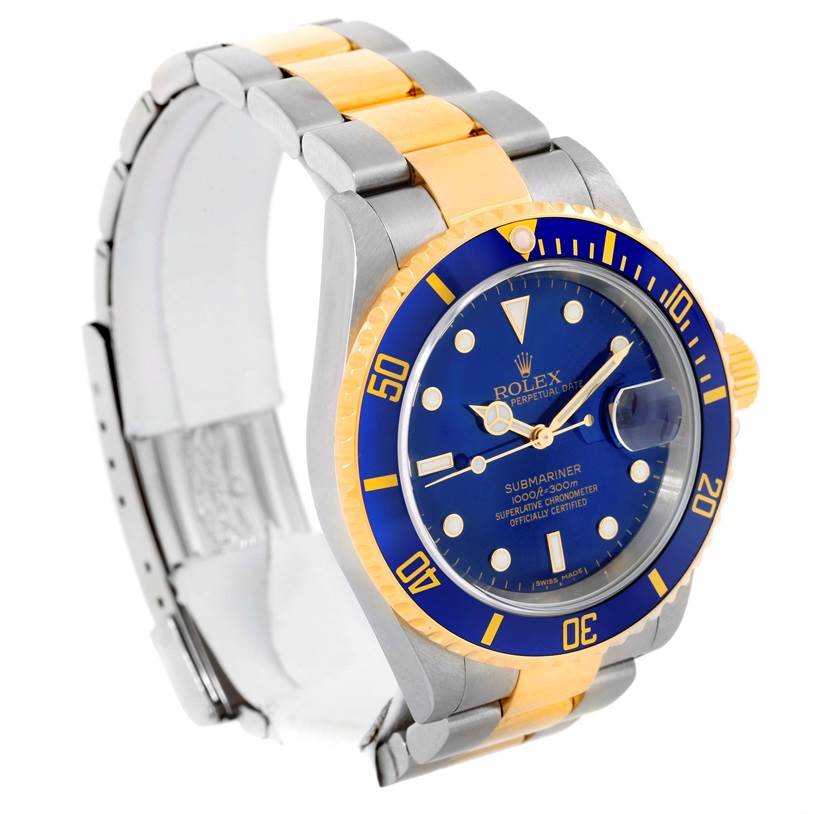 The image shows a Rolex Submariner 16613 Men
s Steel and Gold (two tone) Blue Dial 16613 Men
s Steel and Gold (two tone) Blue Dial watch, angled to display its blue dial, bezel, and two-tone metal bracelet.
