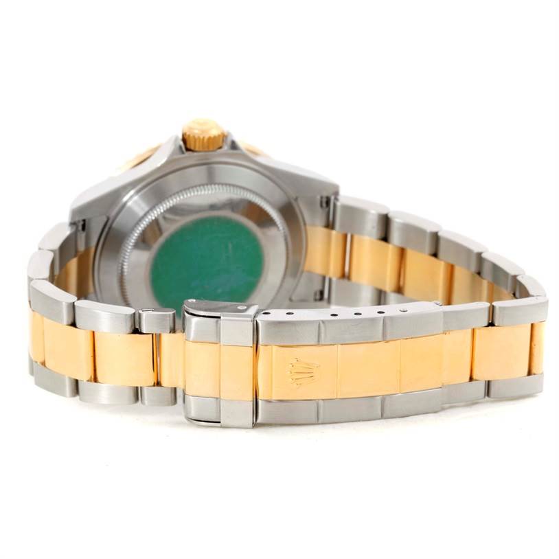 The image shows the back view of a Rolex Submariner 16613 Men
s Steel and Gold (two tone) Blue Dial 16613 Men
s Steel and Gold (two tone) Blue Dial watch, highlighting the bi-color bracelet and clasp.