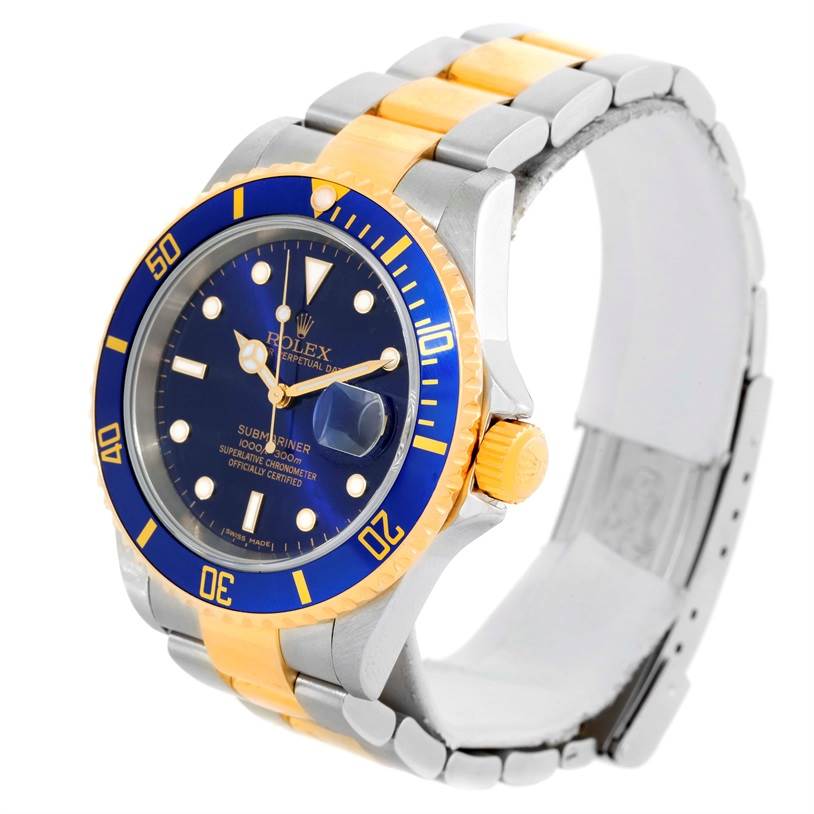 This image showcases a Rolex Submariner 16613 Men
s Steel and Gold (two tone) Blue Dial 16613 Men
s Steel and Gold (two tone) Blue Dial watch at a three-quarter angle, highlighting its blue dial, gold accents, and two-tone bracelet.