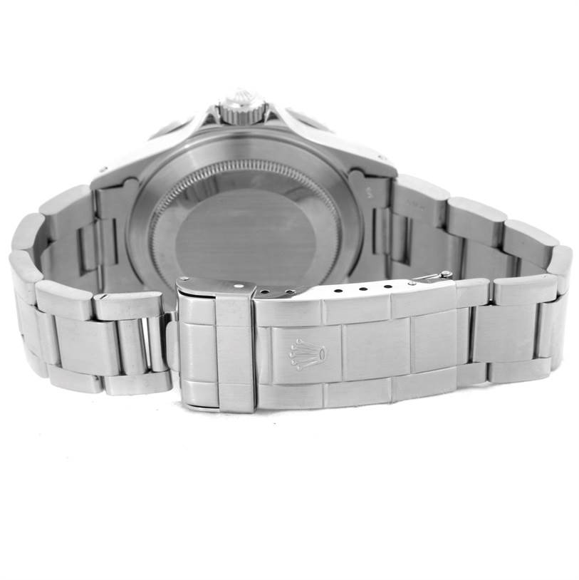 The image shows the back view of a Rolex Submariner 168000 Men
s Stainless Steel Black Dial 168000 Men
s Stainless Steel Black Dial watch, focusing on the case back and the bracelet with its clasp.