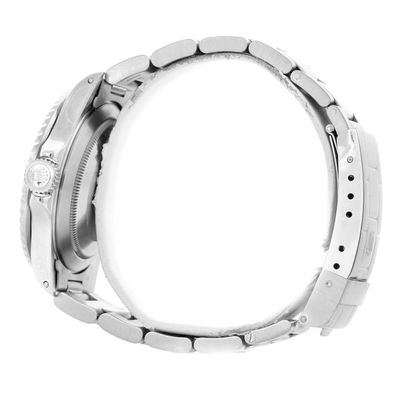 The image shows a side view of a Rolex Submariner 168000 Men
s Stainless Steel Black Dial 168000 Men
s Stainless Steel Black Dial watch, highlighting its crown, case, and bracelet.