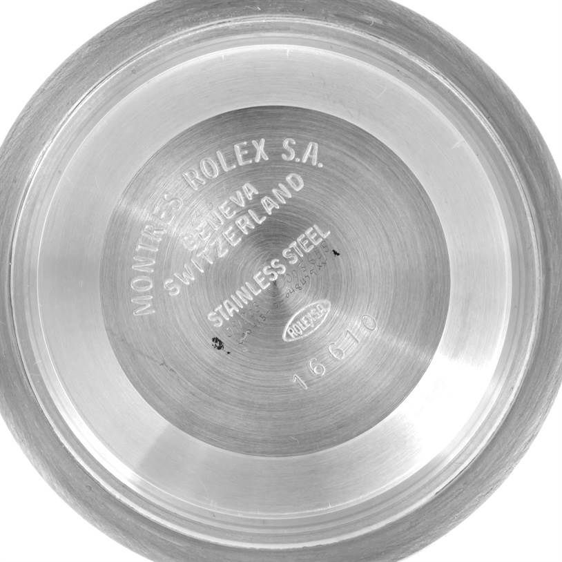 The image shows the case back of a Rolex Submariner 16613 Men's Steel and Gold (two tone) Blue Dial 16613 Men's Steel and Gold (two tone) Blue Dial watch, displaying inscriptions including the model number 16610 and "Stainless Steel."