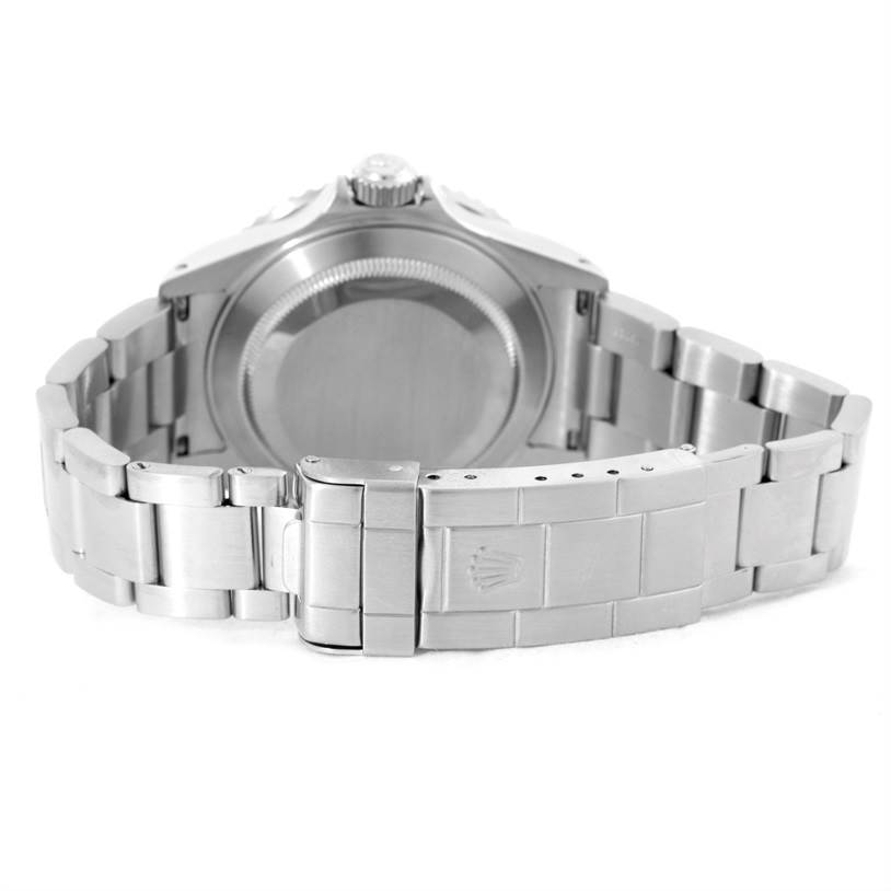 The image shows the back case and bracelet with the clasp of a Rolex Submariner 16610 Men
s Stainless Steel Black Dial 16610 Men
s Stainless Steel Black Dial watch.