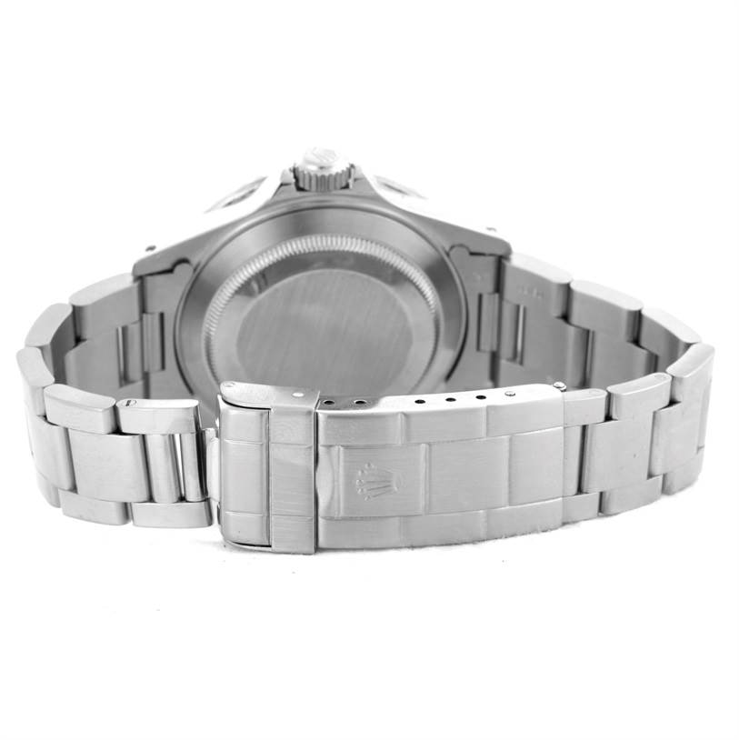 The image shows the back angle of a Rolex Submariner 16610 Men
s Stainless Steel Black Dial 16610 Men
s Stainless Steel Black Dial watch, highlighting its case back, bracelet, and clasp.