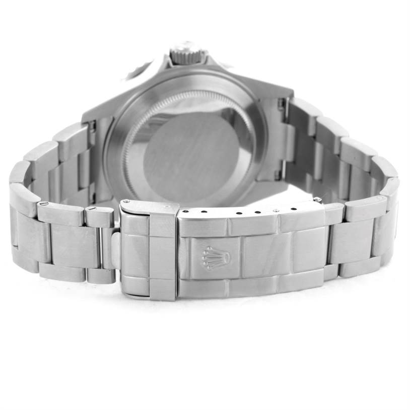 The image shows the backside and clasp of a Rolex Submariner 16610LV Men
s Stainless Steel Black Dial 16610LV Men
s Stainless Steel Black Dial watch, highlighting the bracelet and case back.