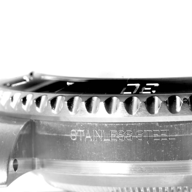 This image shows a close-up of the bezel and stainless steel case of a Rolex Submariner 116610 Men
s Stainless Steel Black Dial 116610 Men
s Stainless Steel Black Dial watch.