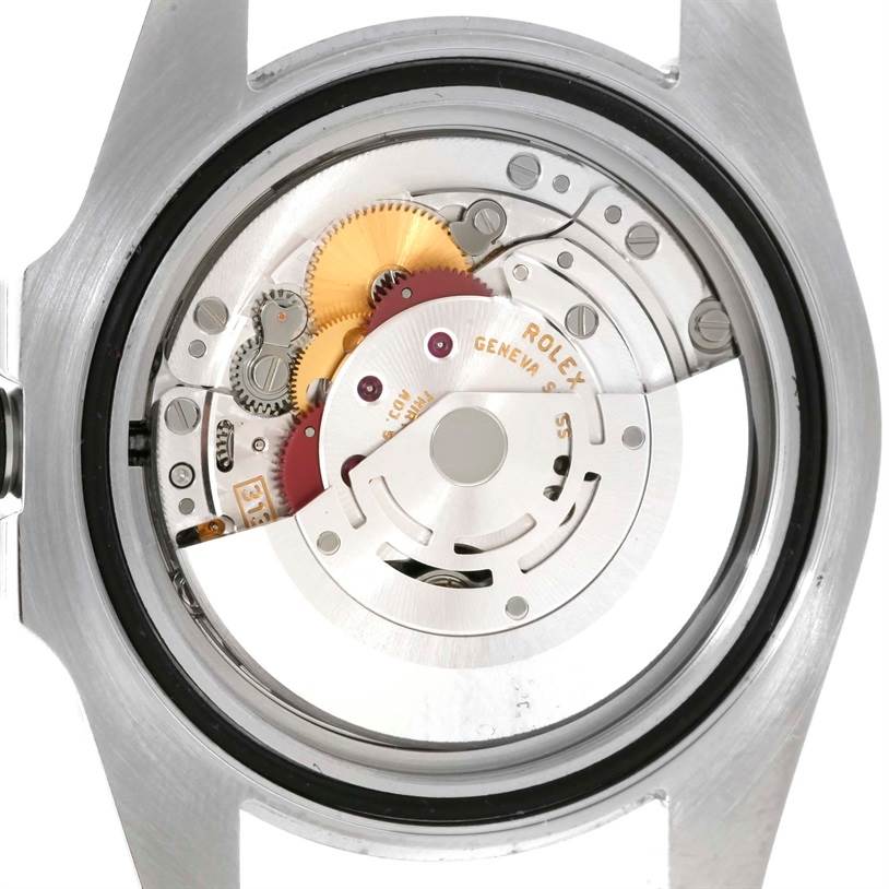 This image shows a close-up of the movement components inside a Rolex Submariner 116610 Men
s Stainless Steel Black Dial 116610 Men
s Stainless Steel Black Dial watch, seen from the back.