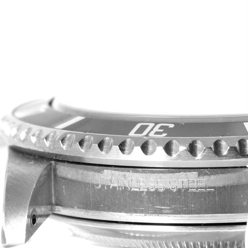 This image shows a close-up of the bezel, case, and lugs of the Rolex Submariner 16610 Men
s Stainless Steel Black Dial 16610 Men
s Stainless Steel Black Dial watch.