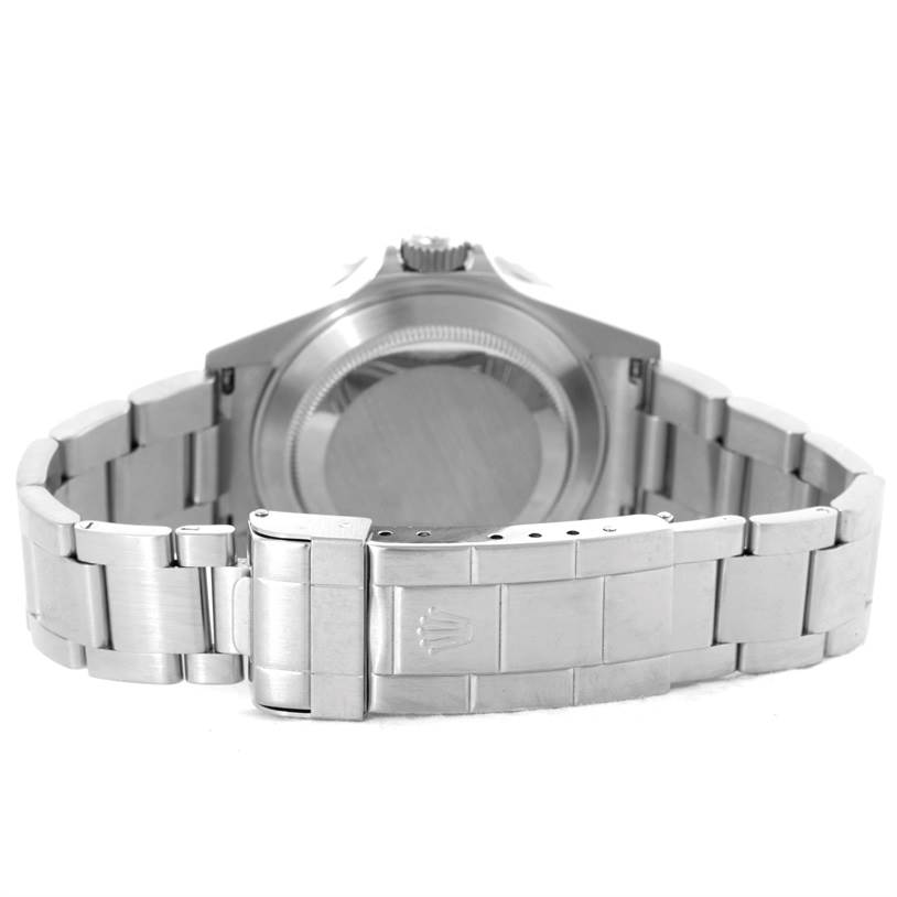 The image shows the back of a stainless steel Rolex Submariner 16610 Men
s Stainless Steel Black Dial 16610 Men
s Stainless Steel Black Dial watch, including the case back and bracelet.