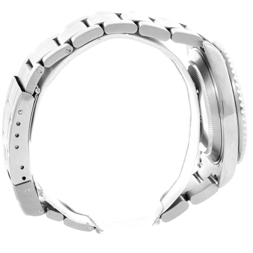 The image shows a side profile of the Rolex Submariner 16610 Men
s Stainless Steel Black Dial 16610 Men
s Stainless Steel Black Dial watch, highlighting the bracelet, clasp, and case.