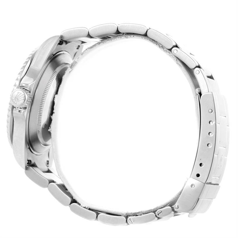 The image shows a side profile of the Rolex Submariner 16610 Men
s Stainless Steel Black Dial 16610 Men
s Stainless Steel Black Dial watch, highlighting its bezel, crown, and bracelet.