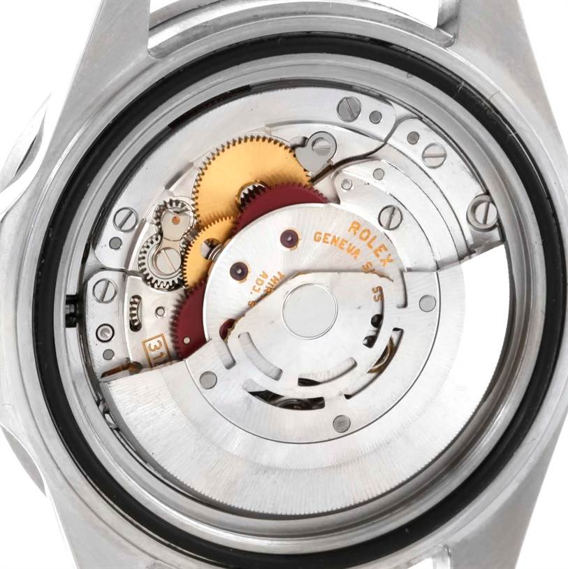 This image shows the internal mechanical parts of a Rolex Submariner 16610 Men
s Stainless Steel Black Dial 16610 Men
s Stainless Steel Black Dial watch from a rear angle.