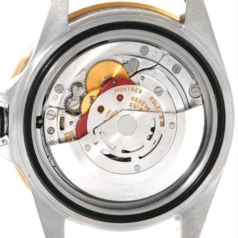 The image shows the back view of the Rolex Submariner 16613 Men's Steel and Gold (two tone) Blue Dial 16613 Men's Steel and Gold (two tone) Blue Dial watch, focusing on its internal mechanical movement components.