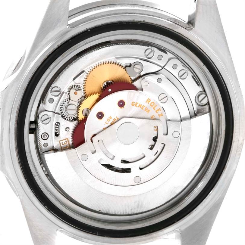 The image shows the intricate internal mechanism of a Rolex Submariner 16610 Men
s Stainless Steel Black Dial 16610 Men
s Stainless Steel Black Dial watch from a back view.