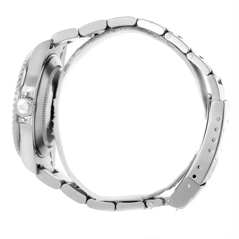 The image shows a side profile of a Rolex Submariner 16610 Men
s Stainless Steel Black Dial 16610 Men
s Stainless Steel Black Dial watch, highlighting the crown, case, and bracelet links.