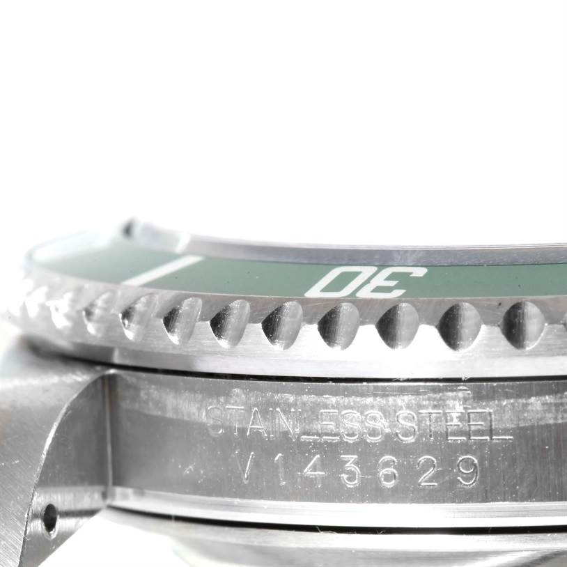 This image shows a close-up side view focusing on the bezel and part of the case of the Rolex Submariner 16610LV Men
s Stainless Steel Black Dial 16610LV Men
s Stainless Steel Black Dial watch.