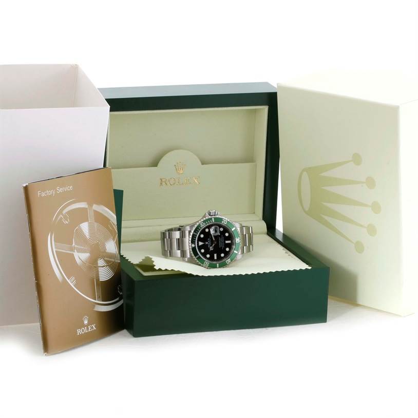 The Rolex Submariner 16610LV Men
s Stainless Steel Black Dial 16610LV Men
s Stainless Steel Black Dial watch is displayed at a front angle within its open green box, alongside a booklet and outer packaging.