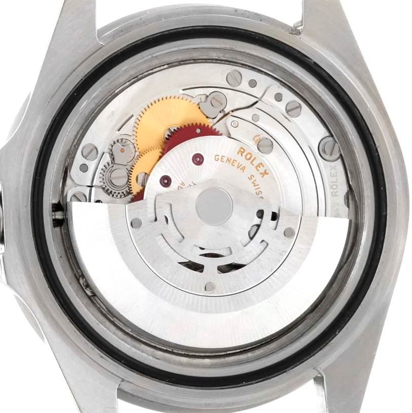 This image shows the internal mechanism and movement of a Rolex Submariner 16610 Men
s Stainless Steel Black Dial 16610 Men
s Stainless Steel Black Dial watch, viewed from the back with the case removed.
