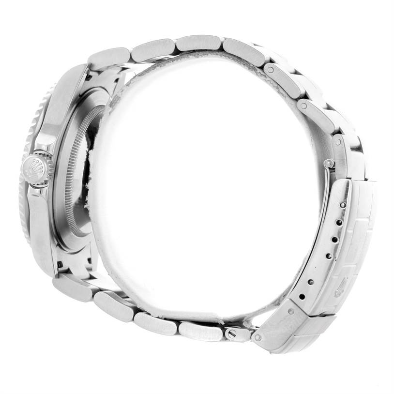 The image shows a side view of the Rolex Submariner 16610 Men
s Stainless Steel Black Dial 16610 Men
s Stainless Steel Black Dial watch, highlighting the bracelet and clasp components.