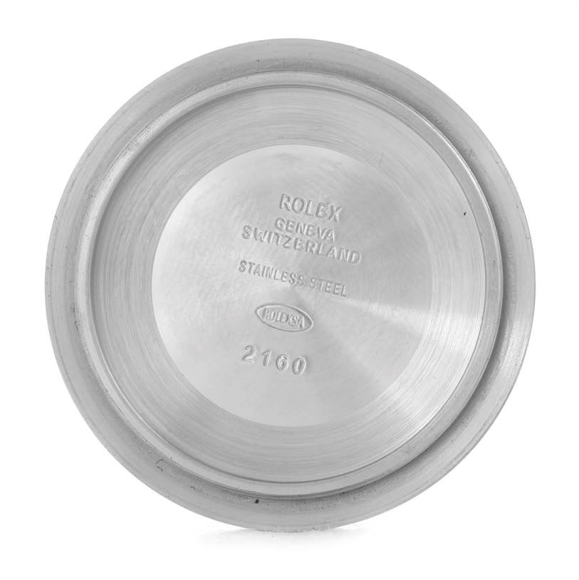 This image shows the interior case back of a Rolex Submariner 16610 Men
s Stainless Steel Black Dial 16610 Men
s Stainless Steel Black Dial watch, engraved with the brand name and other details.