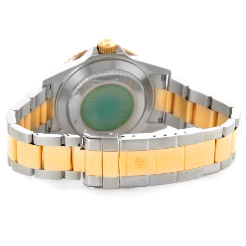 This image shows the back view and bracelet clasp of a Rolex Submariner 16613 Men's Steel and Gold (two tone) Blue Dial 16613 Men's Steel and Gold (two tone) Blue Dial watch.