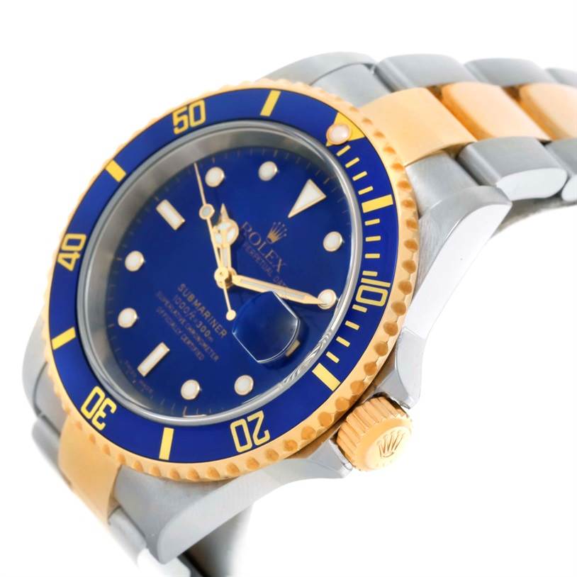 The image shows a side-angle view of a Rolex Submariner 16613 Men's Steel and Gold (two tone) Blue Dial 16613 Men's Steel and Gold (two tone) Blue Dial, highlighting its blue dial, two-tone bracelet, and crown.