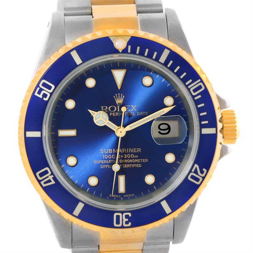 This image shows a front view of a Rolex Submariner 16613 Men
s Steel and Gold (two tone) Blue Dial 16613 Men
s Steel and Gold (two tone) Blue Dial watch, highlighting its blue dial, gold accents, and date window at 3 o
clock.
