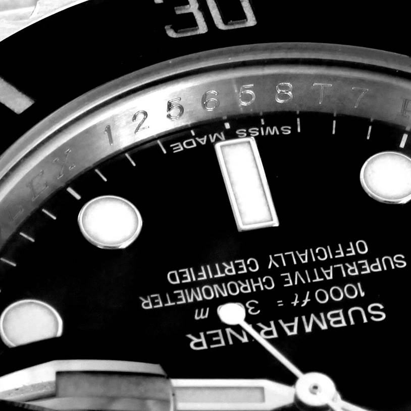 The image shows a close-up of the dial and bezel of a Rolex Submariner 116610 Men
s Stainless Steel Black Dial 116610 Men
s Stainless Steel Black Dial, highlighting its details and text.