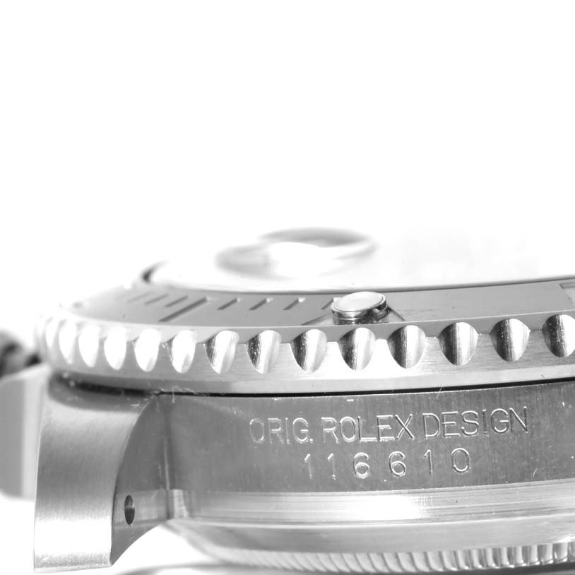 This image shows a close-up of the side view of a Rolex Submariner 116610 Men
s Stainless Steel Black Dial 116610 Men
s Stainless Steel Black Dial model, highlighting the watch
s bezel and case with engraved text.