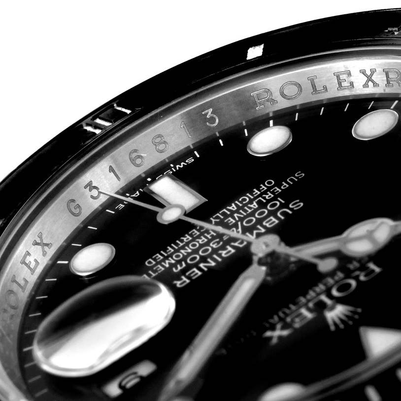 This close-up image shows the dial, hands, and part of the rehaut with engraved serial number of a Rolex Submariner 116610 Men
s Stainless Steel Black Dial 116610 Men
s Stainless Steel Black Dial watch.